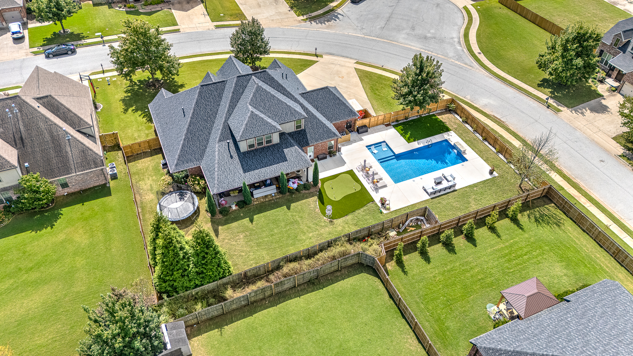 Custom pool build with integrated spa and premium equipment - NWA