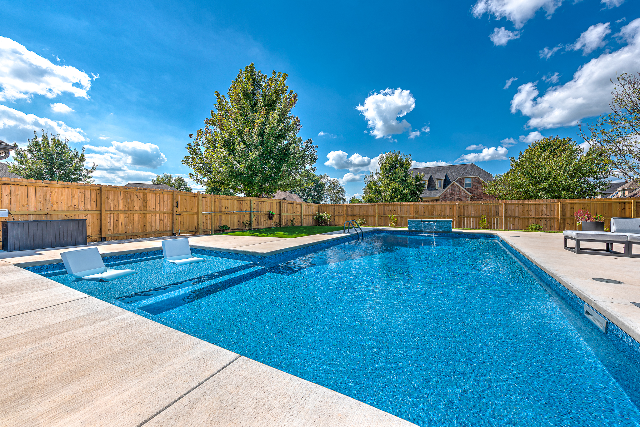 Backyard pool with LED lighting and salt generator system - NWA