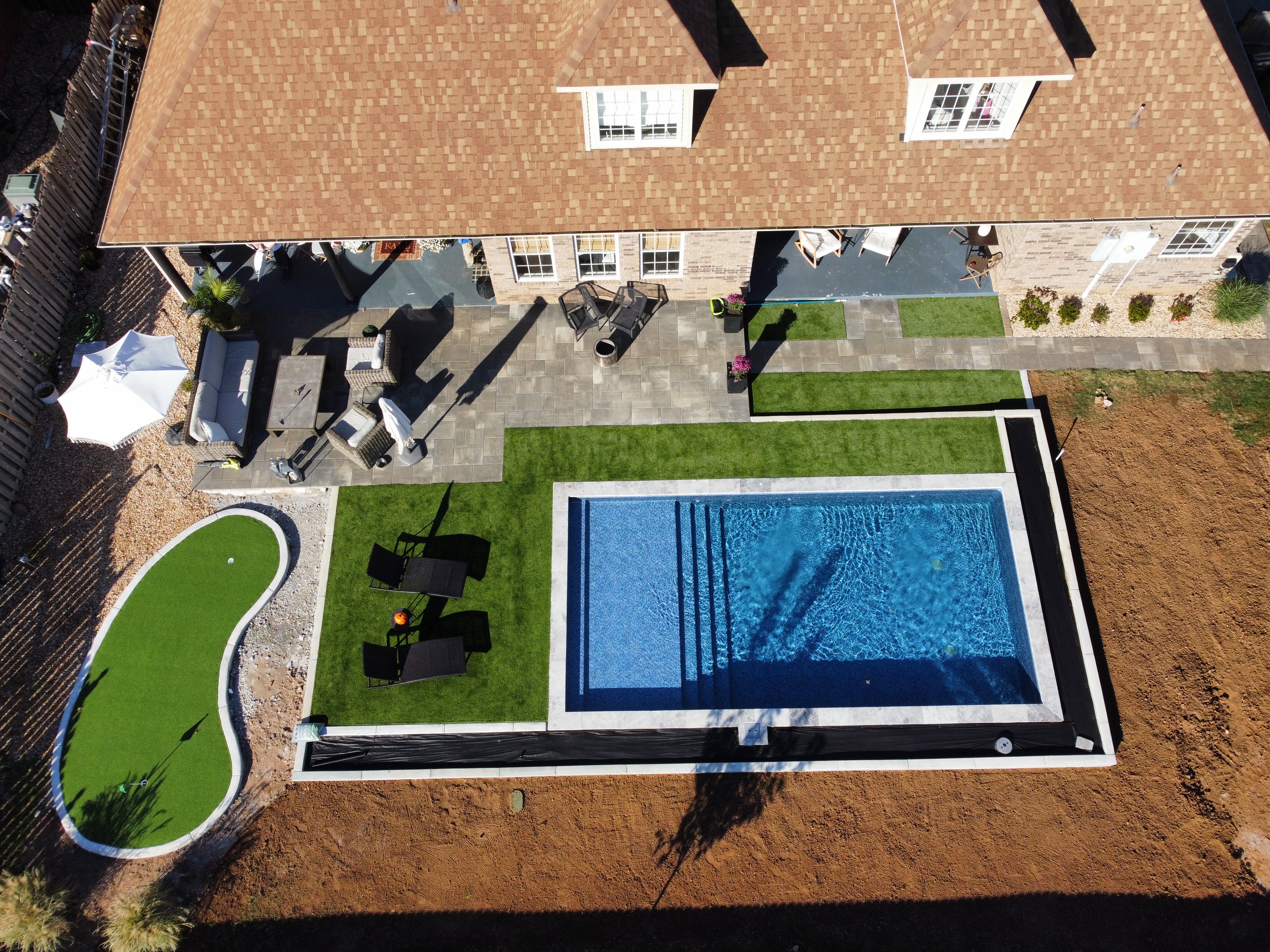 Inground pool with premium plaster finish and step entry - Northwest Arkansas